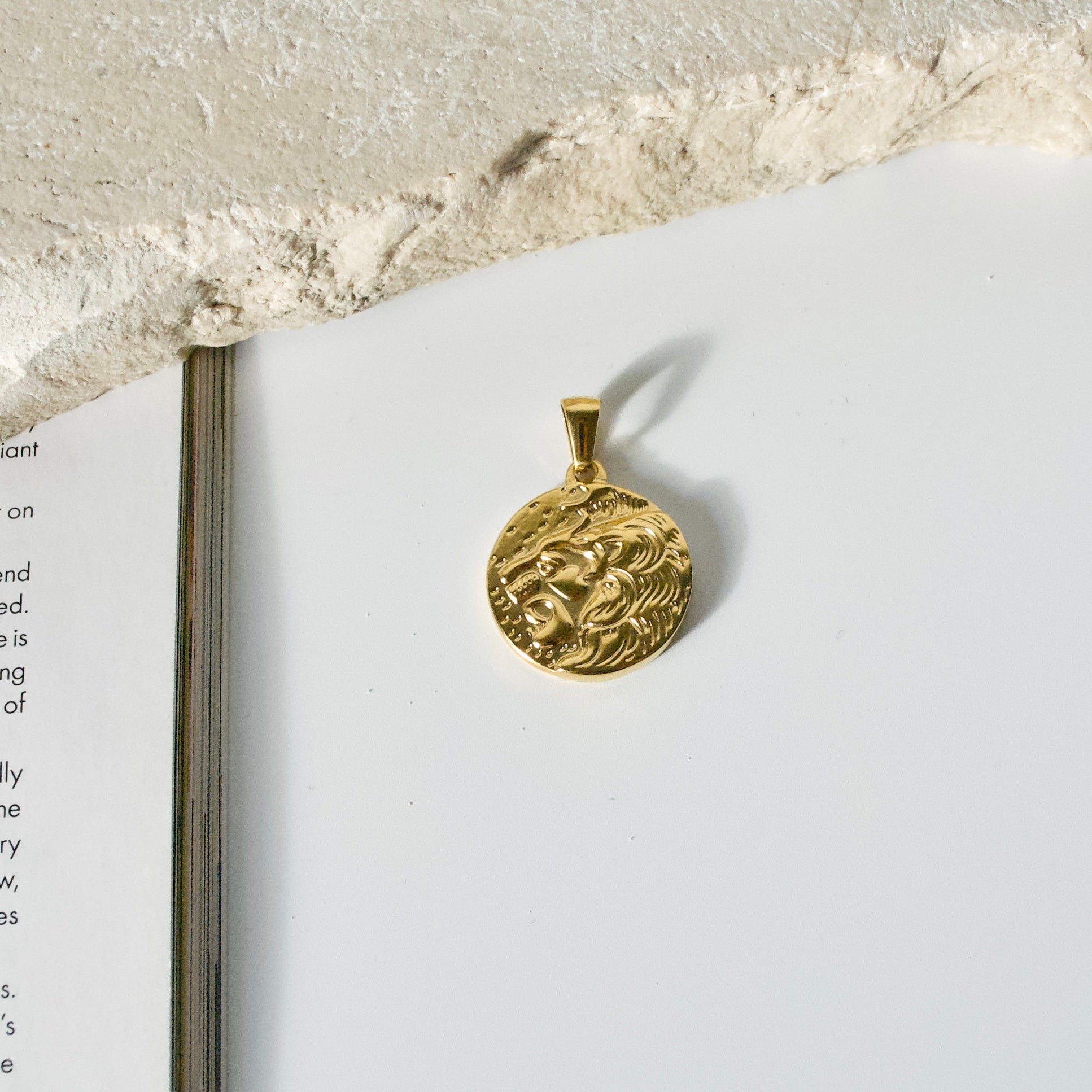 Gold lion deals coin pendant